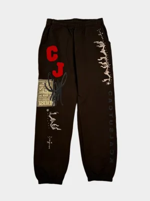 Pantaloni Marroni Travis Scott Flare Con Stampa E Dettagli Grafici