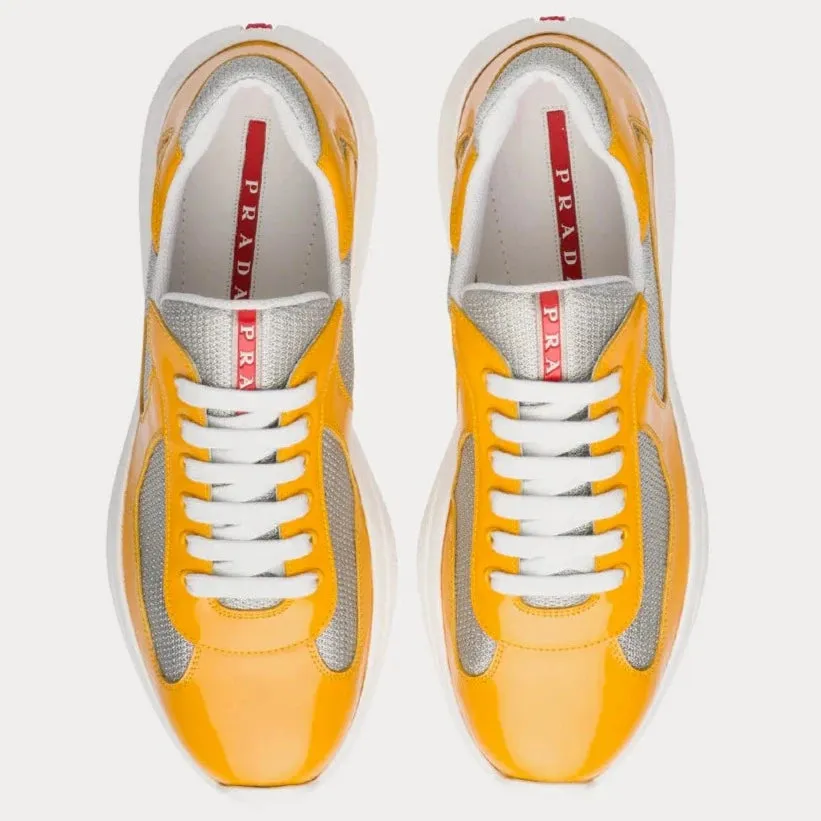 Prada Gold Patent Americas Cup Trainers